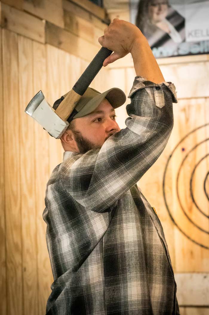 Throwing an axe at Grey Dog Axe Throwing in Marshfield, WI