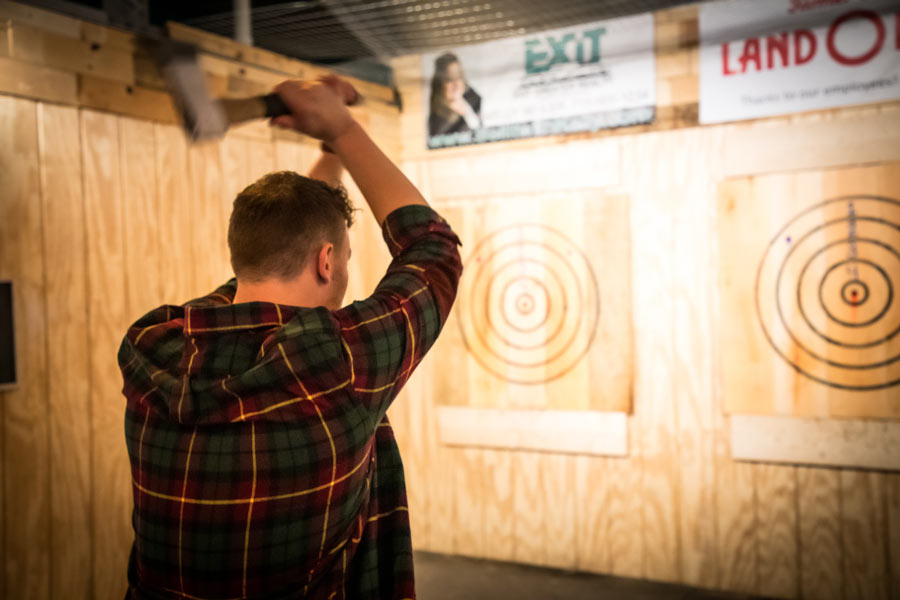Aiming axe to throw at Grey Dog Axe Throwing in Marshfield, WI
